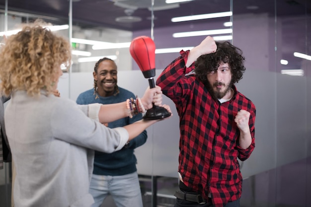 A vibrant image of Venezuelan entrepreneurs celebrating their victory at an entrepreneurial competition, receiving an award for their innovative project.