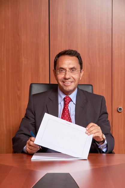 A Venezuelan lawyer handing over a document symbolizing 